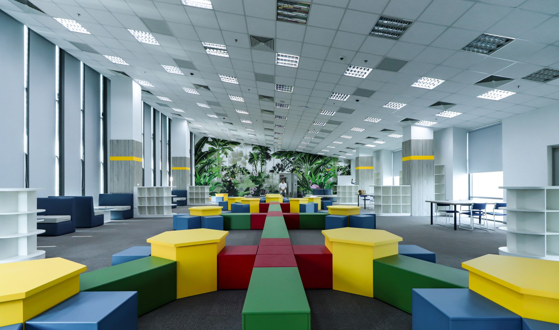 Acoustic fabric stretch ceiling dampening sound in open office interior